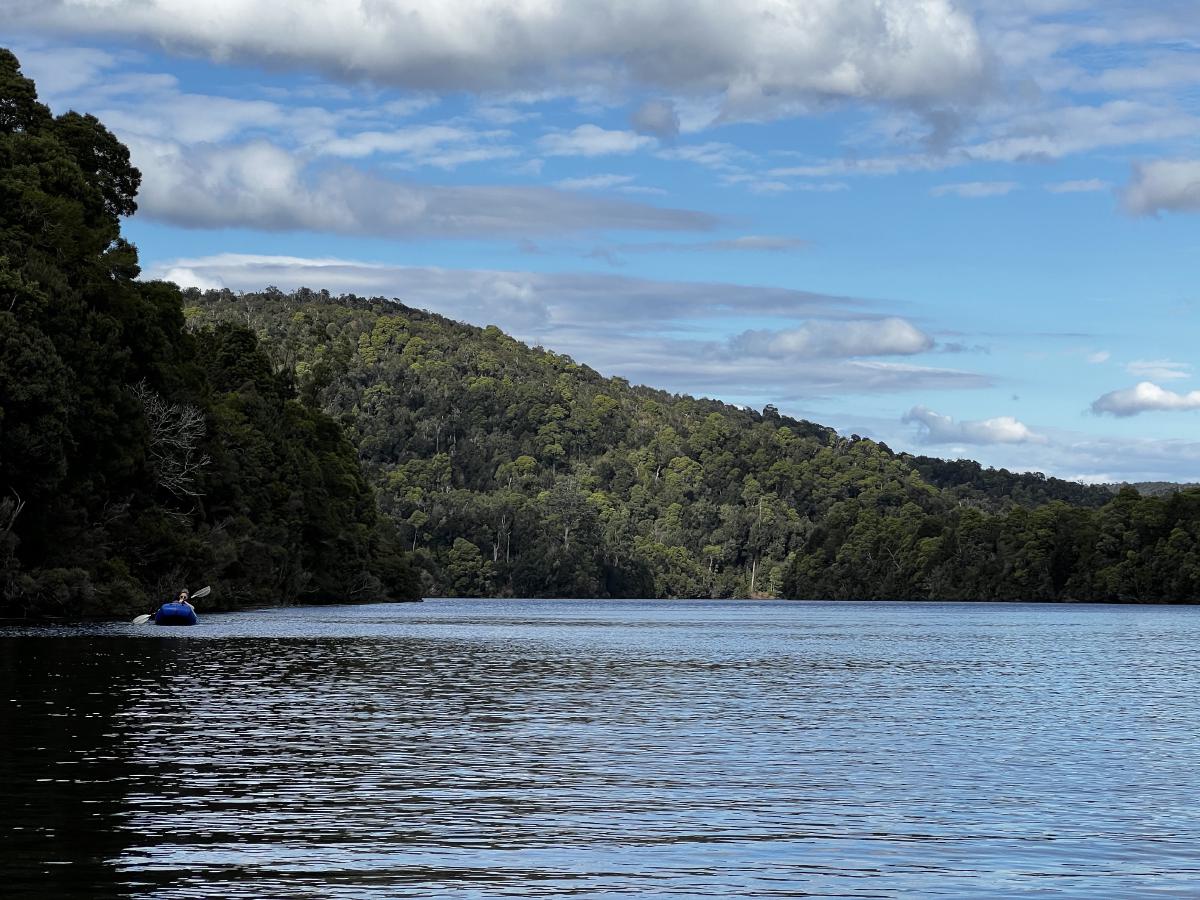 A packraft on the Pieman River