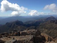 A mountain range/vista with clouds in the sky